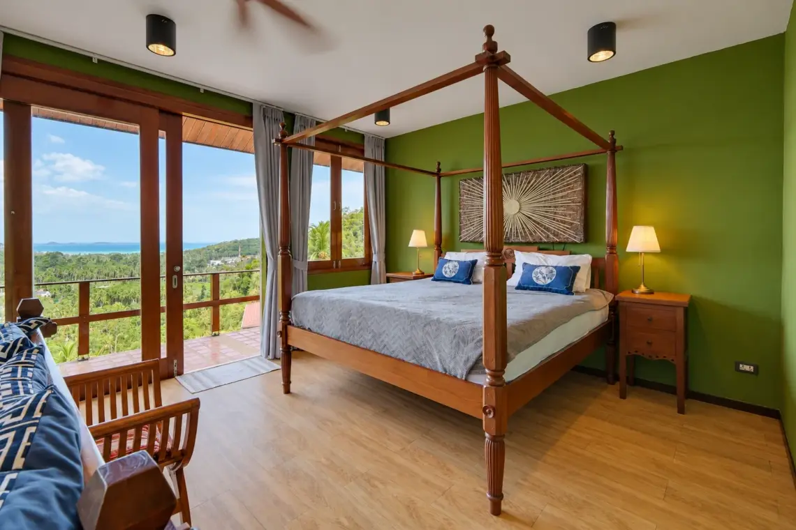 Green bedroom and sitting area at the villa in Taling Ngam, Koh Samui