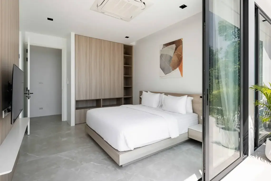 Bedroom with terrace access in a Chaweng Noi pool villa