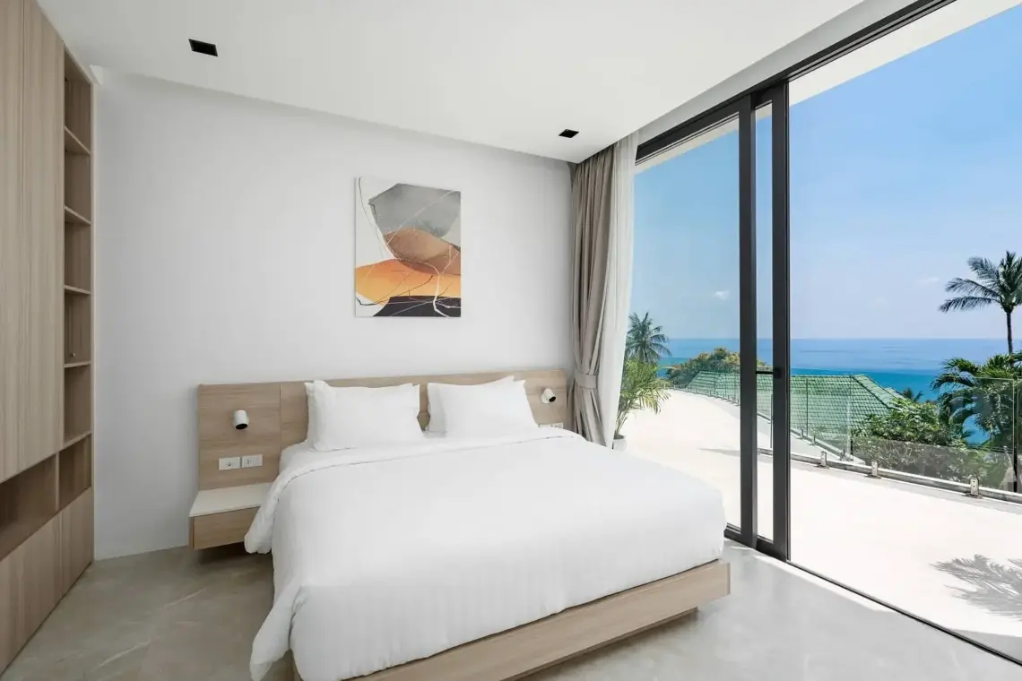 Bedroom opening onto a sea-facing terrace in Chaweng Noi