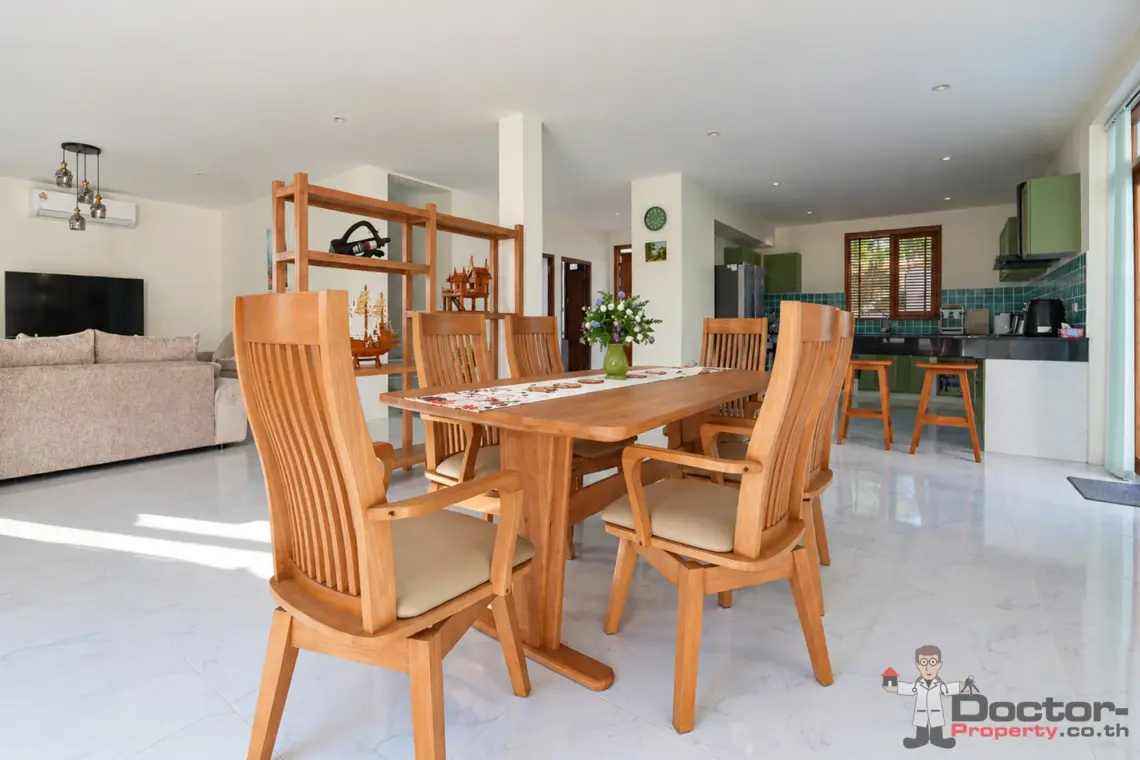 Dining towards kitchen and living at the 4 bedroom pool villa in Plai Laem, Koh Samui