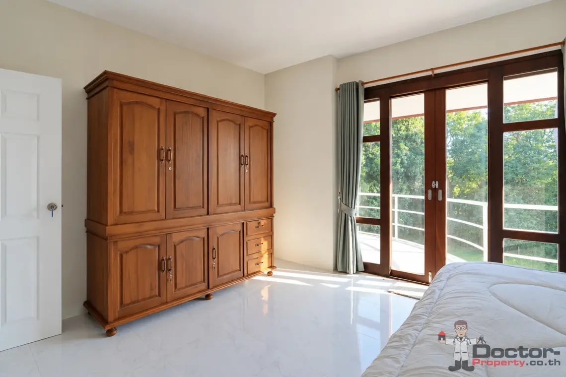 Bedroom storage and balcony at the 4 bedroom pool villa in Plai Laem, Koh Samui