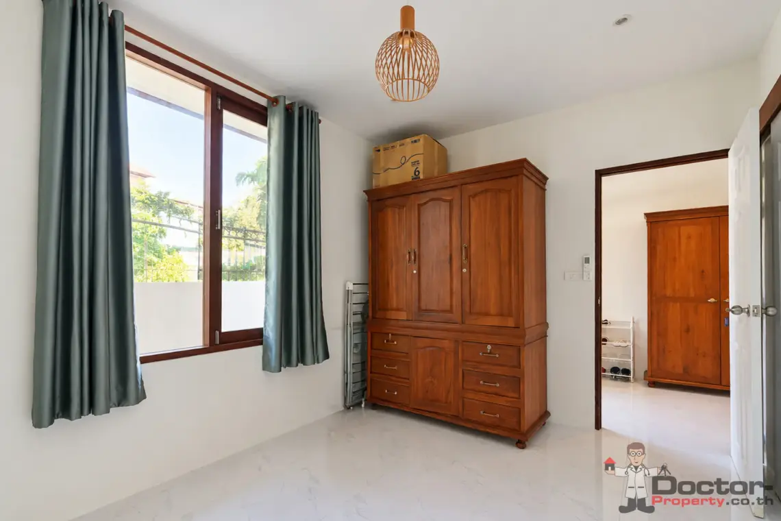 Downstairs bedroom reverse view at the 4 bedroom pool villa in Plai Laem, Koh Samui