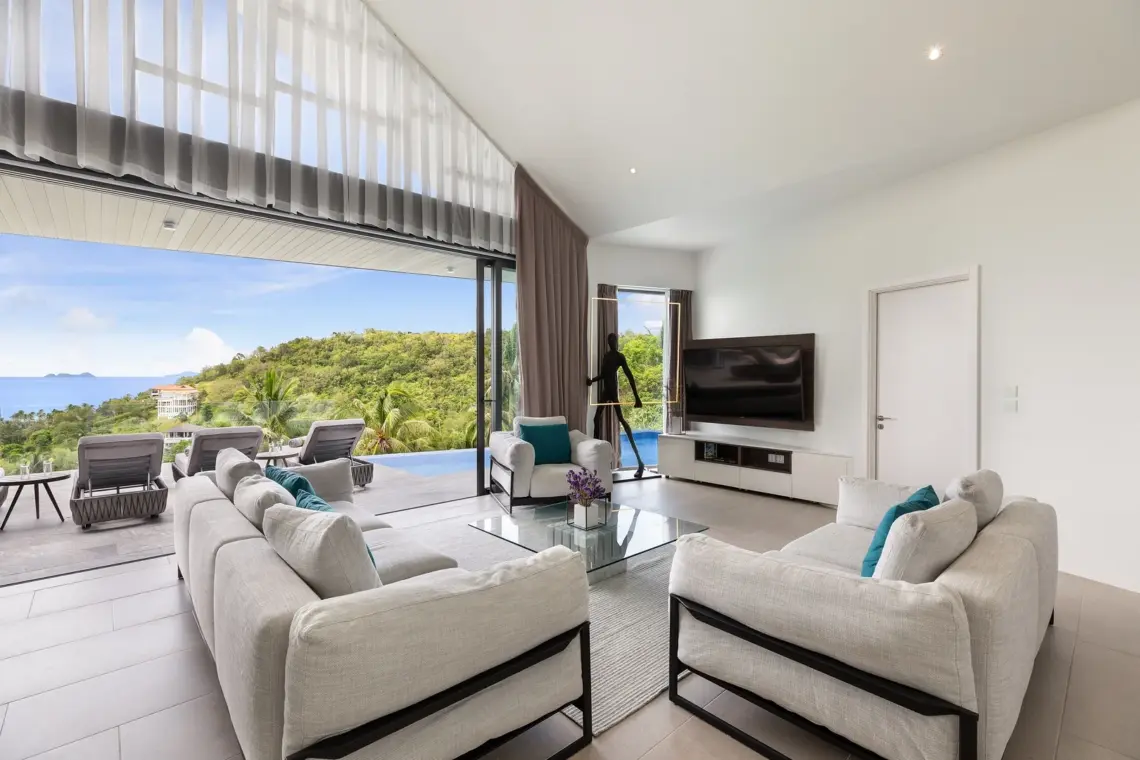 Living room opening towards the sea view terrace