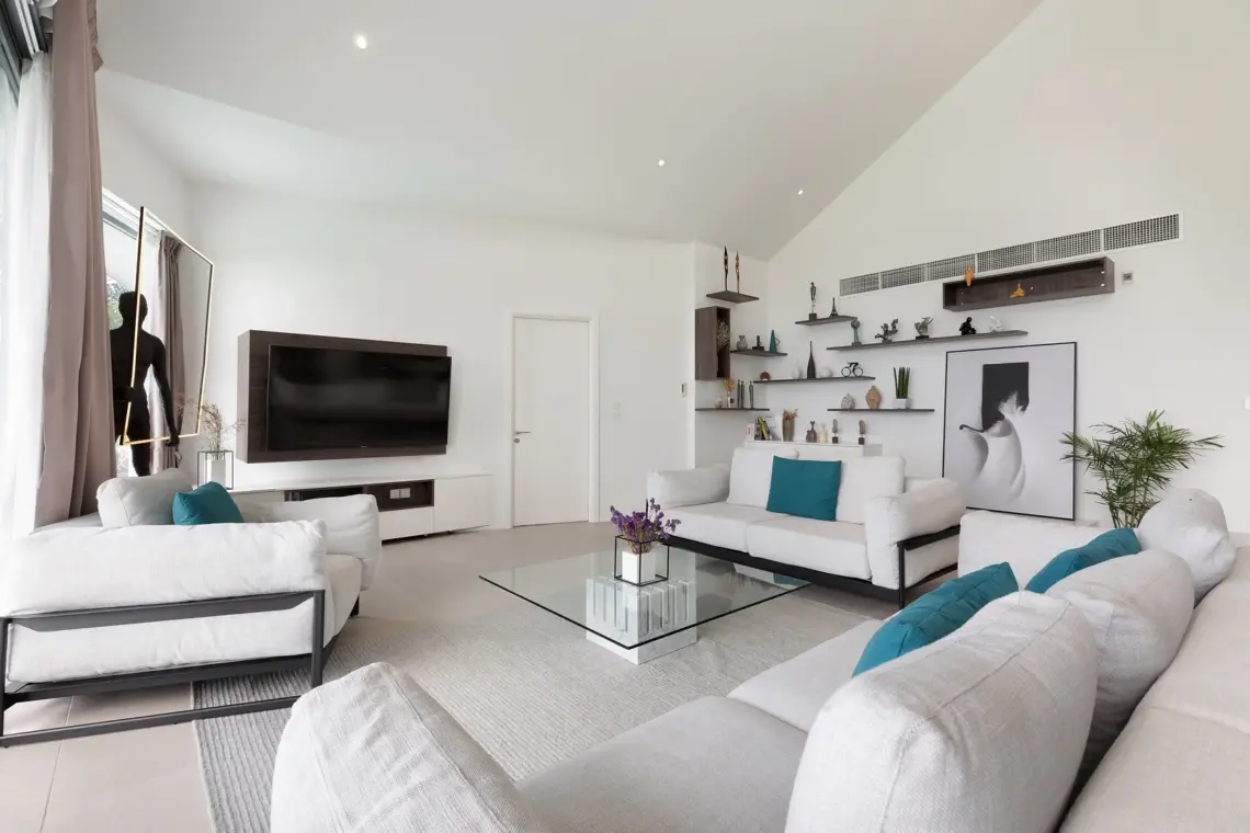 Open-plan living room with staircase