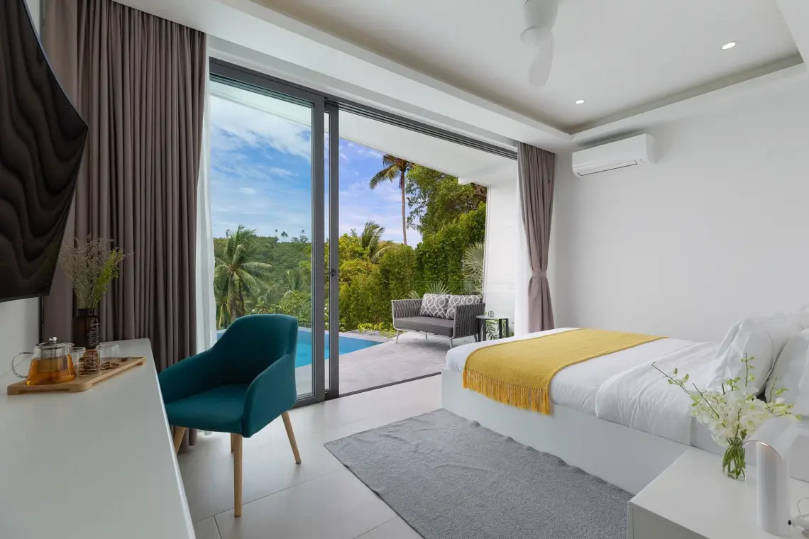 Bedroom opening towards the pool terrace