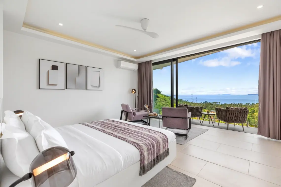 Upper-floor bedroom with sea view balcony