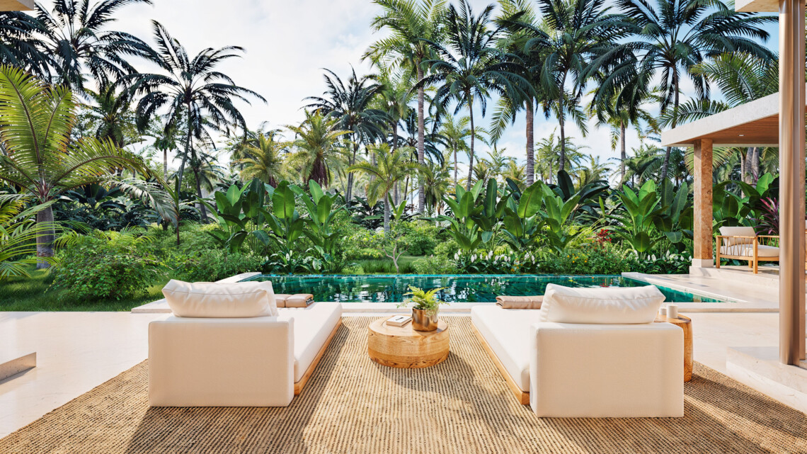 Outdoor lounge seating facing the private pool and tropical garden