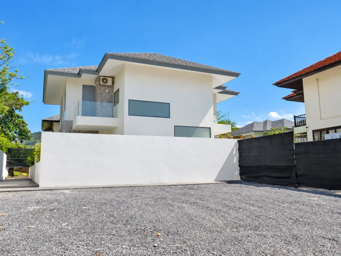 Exterior parking at a completed showcase duplex villa in Bo Phut, Koh Samui