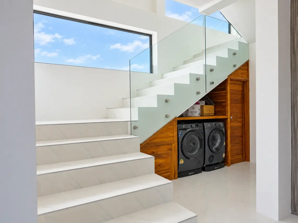 Stairs laundry at a completed showcase duplex villa in Bo Phut, Koh Samui
