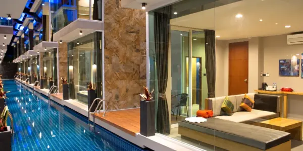 Pool and duplexes at night at a boutique hotel in Bang Rak, Koh Samui
