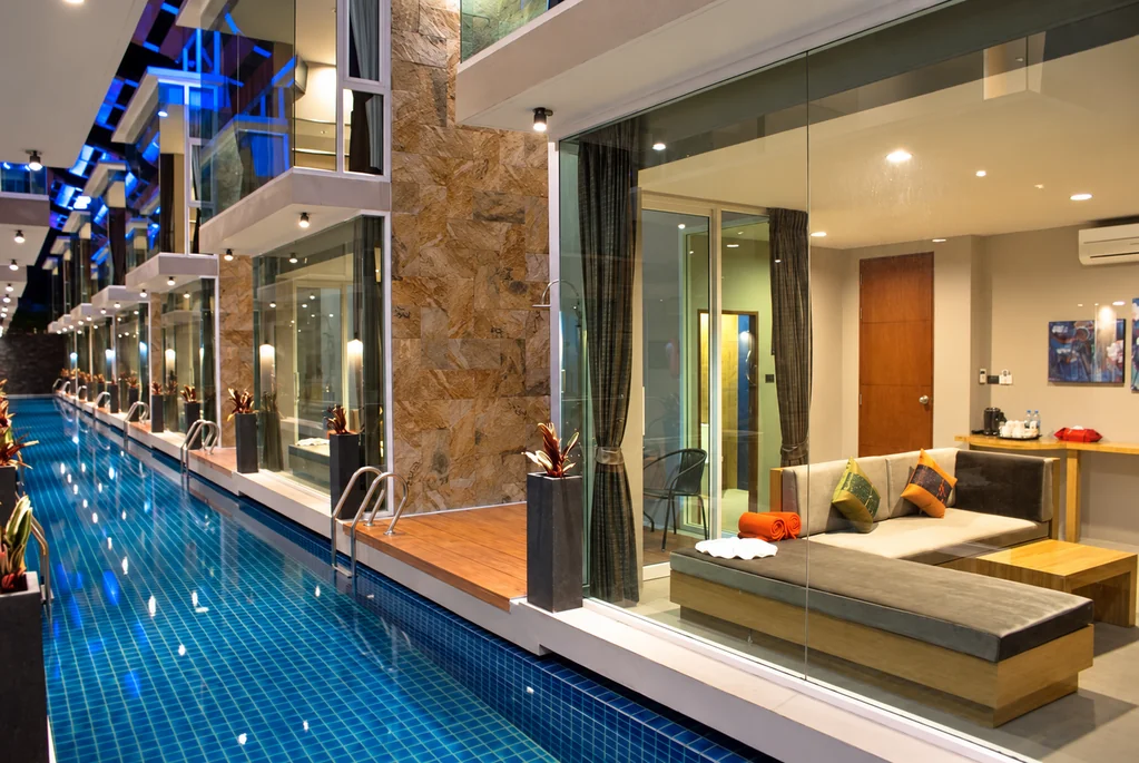 Pool and duplexes at night at a boutique hotel in Bang Rak, Koh Samui