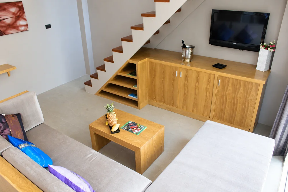 Lounge and staircase at a boutique hotel in Bang Rak, Koh Samui